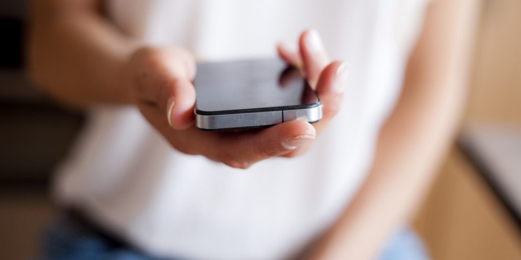 Girl holding a smartphone