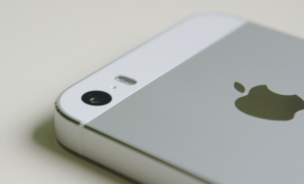 The back of a grey iPhone 5s
