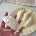 Cute Dumpling Squishy Stress Relief Toy with Keychain - White