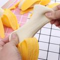 Peelable Banana Dumpling Squishy Toy for Kids and Adults - Yellow